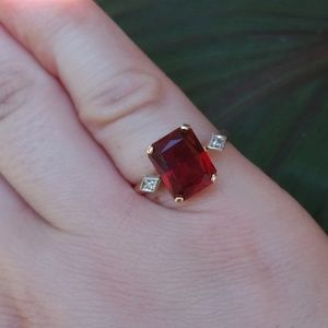 14k gold garnet ring with diamond accents